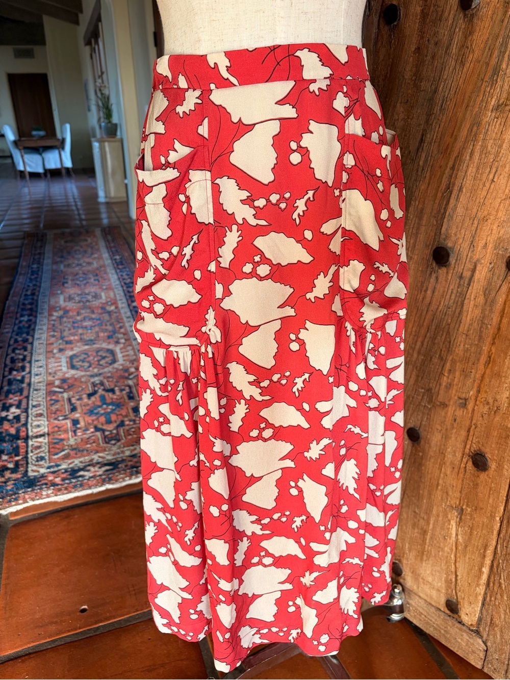 Red, Cream, Black Floral Print Midi Skirt by Raquel Allegra
